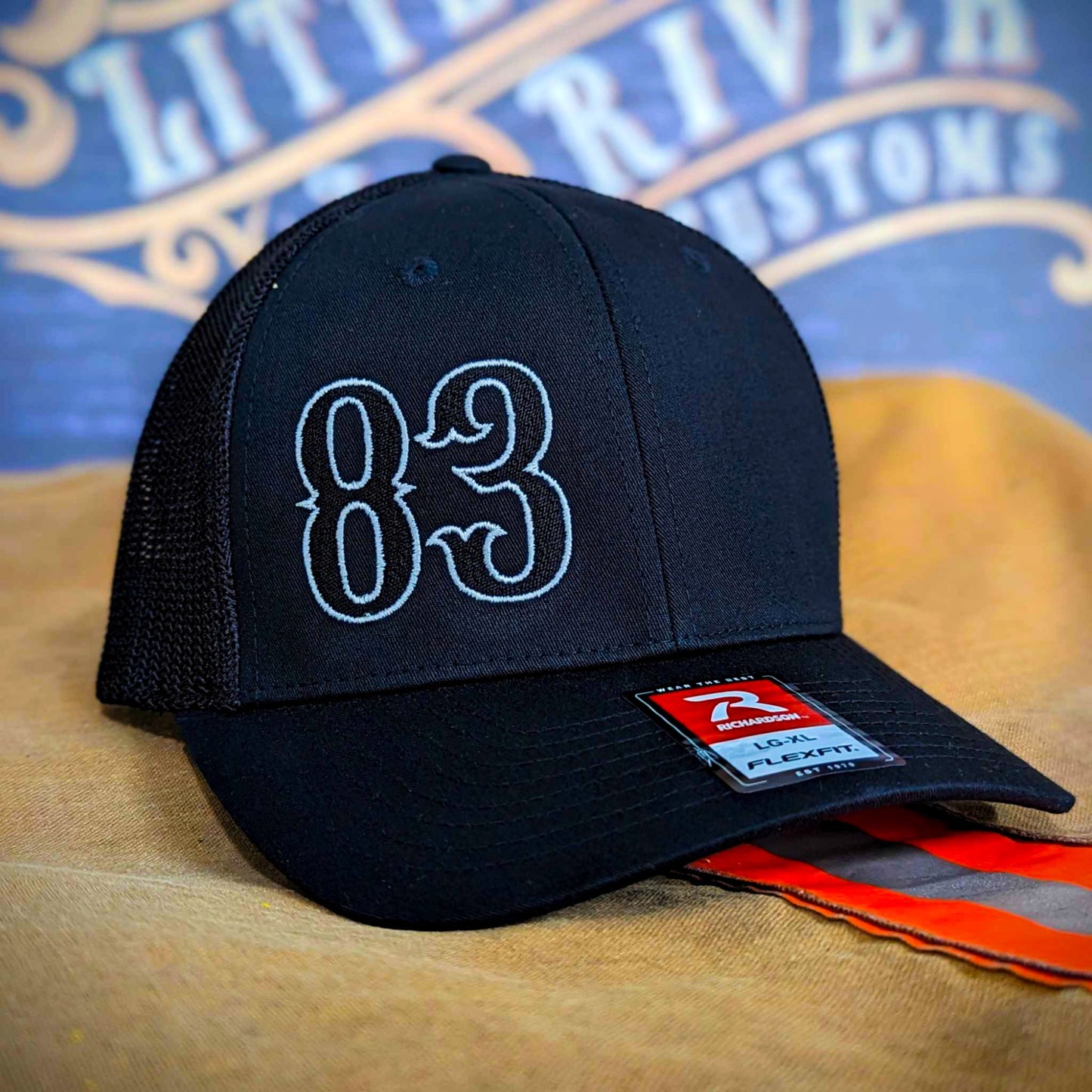 Custom embroidered firefighter hat with bold stitching, structured fit, and premium Richardson snapback design