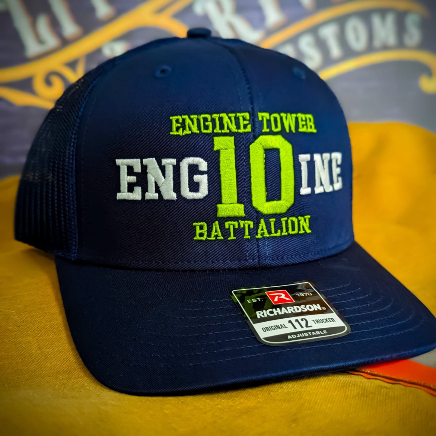 Custom embroidered firefighter hat with bold stitching, structured fit, and premium Richardson snapback design