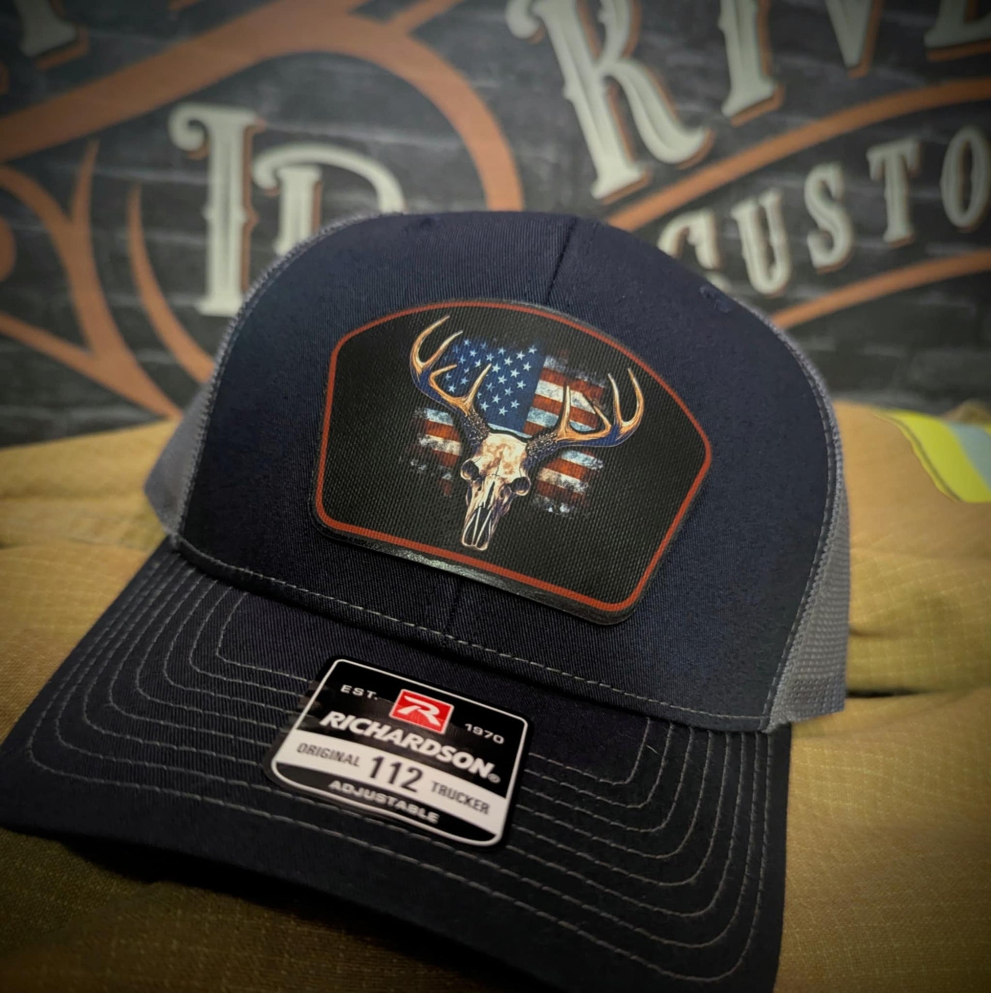 Patriotic buck skull leather patch hat – Richardson brand with American flag deer skull design
