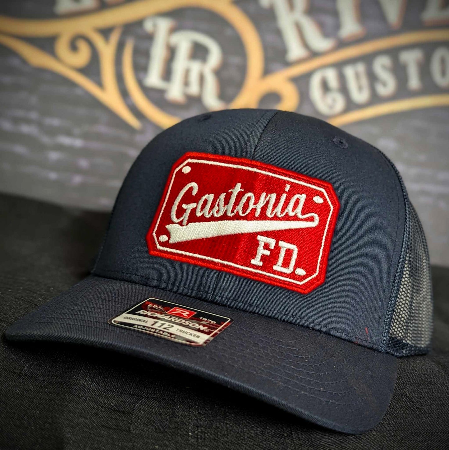 Custom embroidered firefighter hat with bold stitching, structured fit, and premium Richardson snapback design