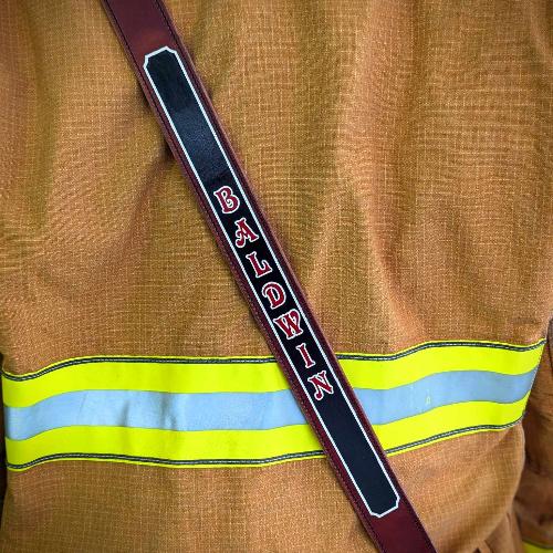 Personalized leather firefighter radio strap with adjustable fit and rugged construction