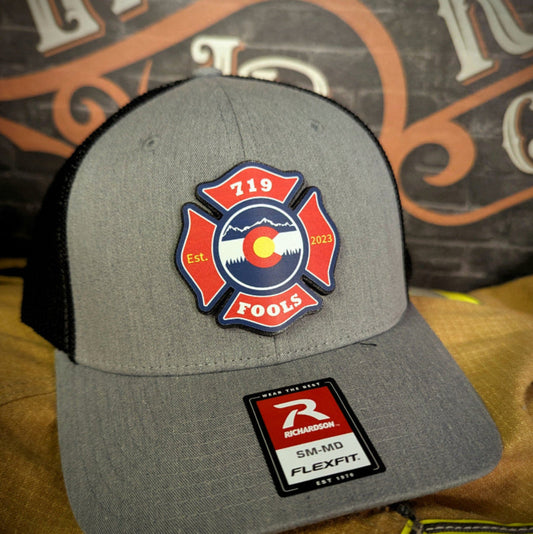 Richardson firefighter hat with 719 FOOLS leather patch – skull logo, axes, and Colorado pride