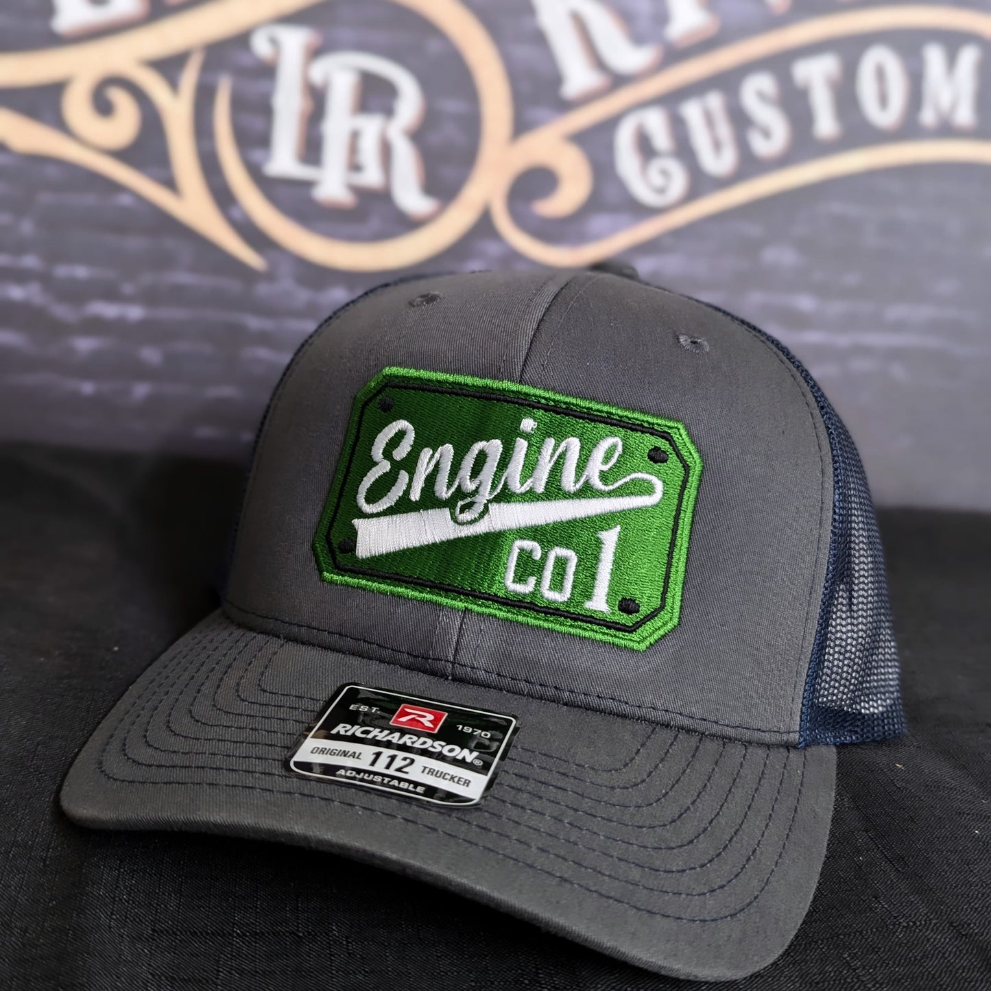 Custom embroidered firefighter hat with bold stitching, structured fit, and premium Richardson snapback design