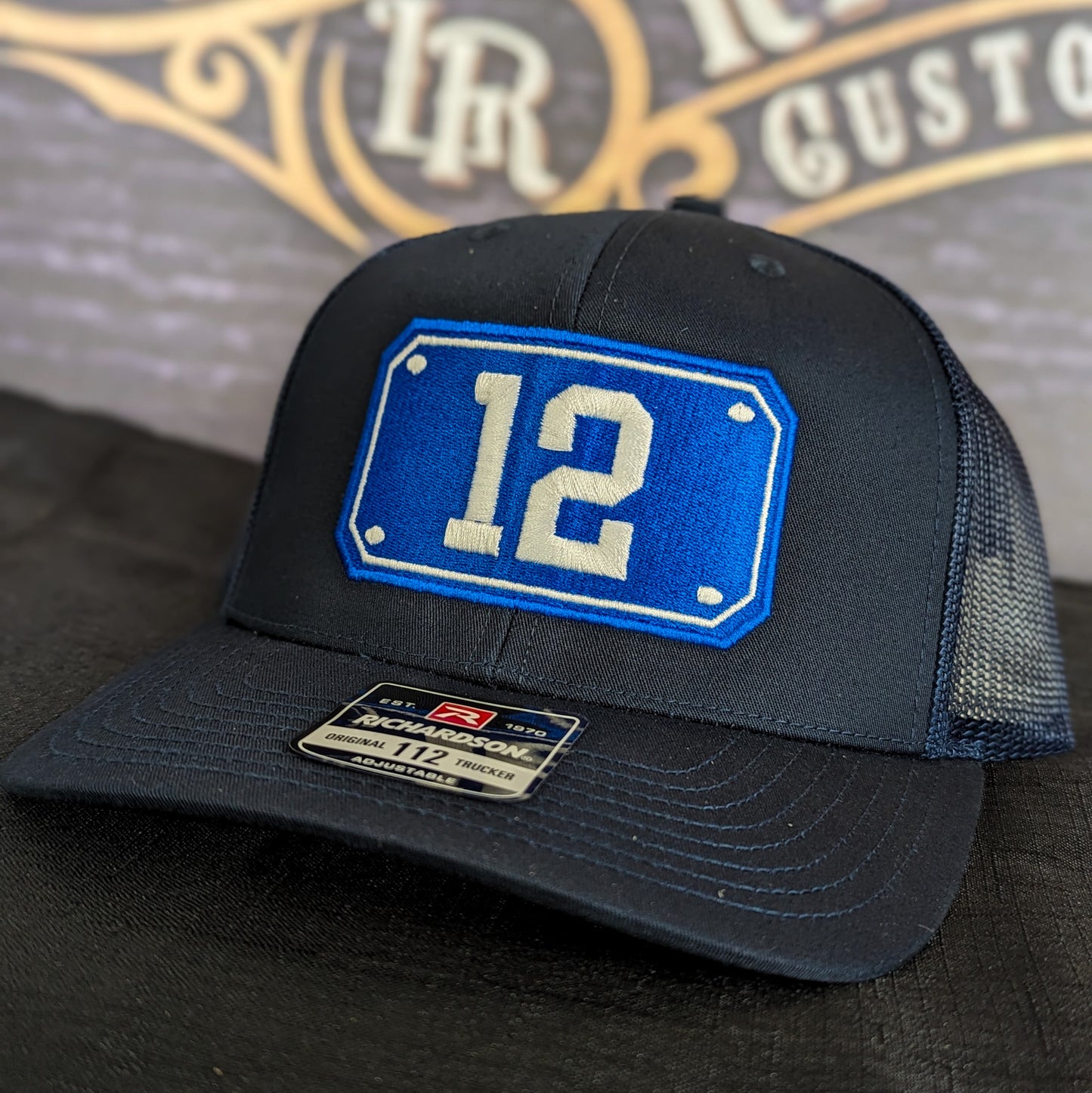 Custom embroidered firefighter hat with bold stitching, structured fit, and premium Richardson snapback design