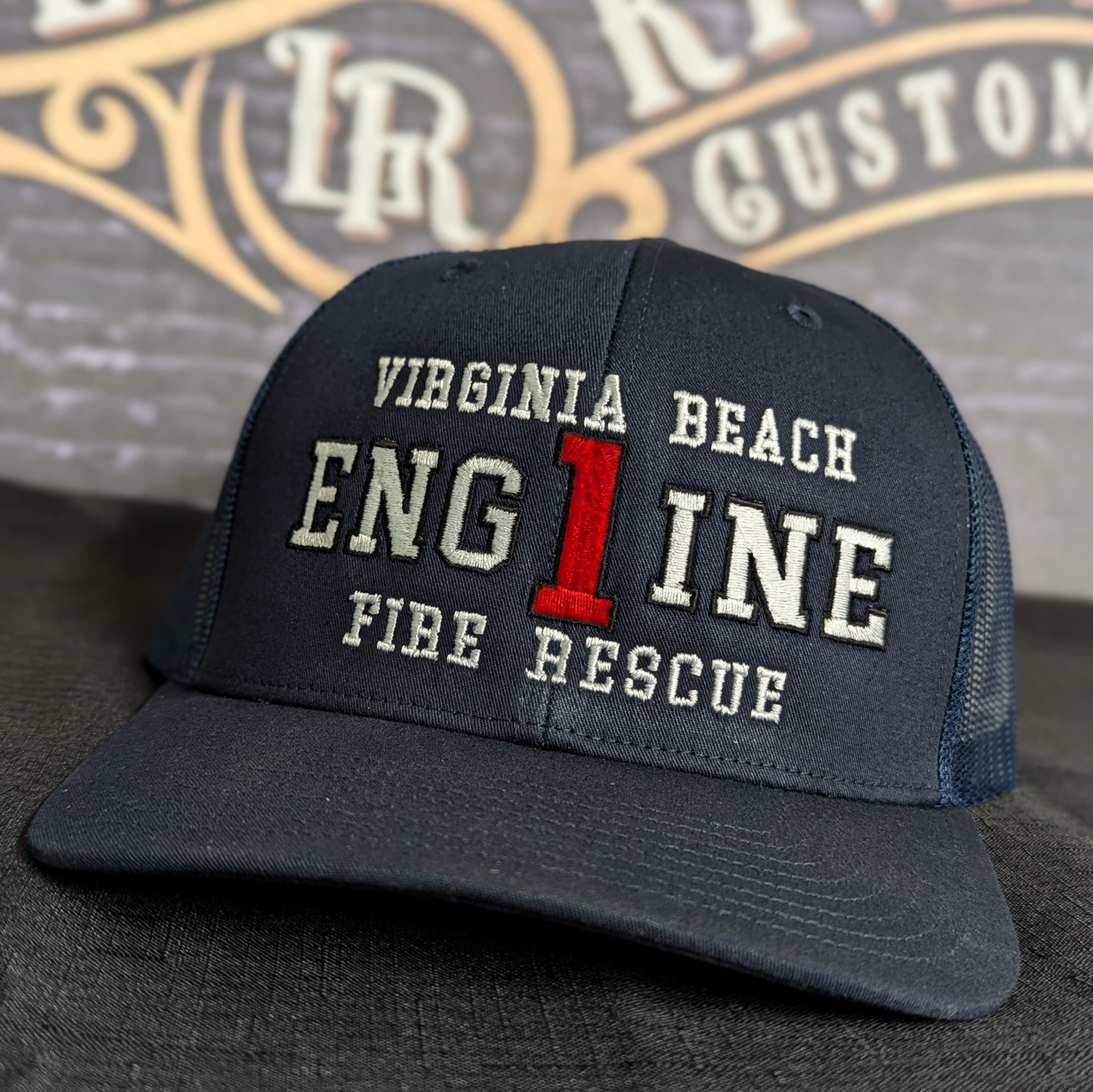Custom embroidered firefighter hat with bold stitching, structured fit, and premium Richardson snapback design