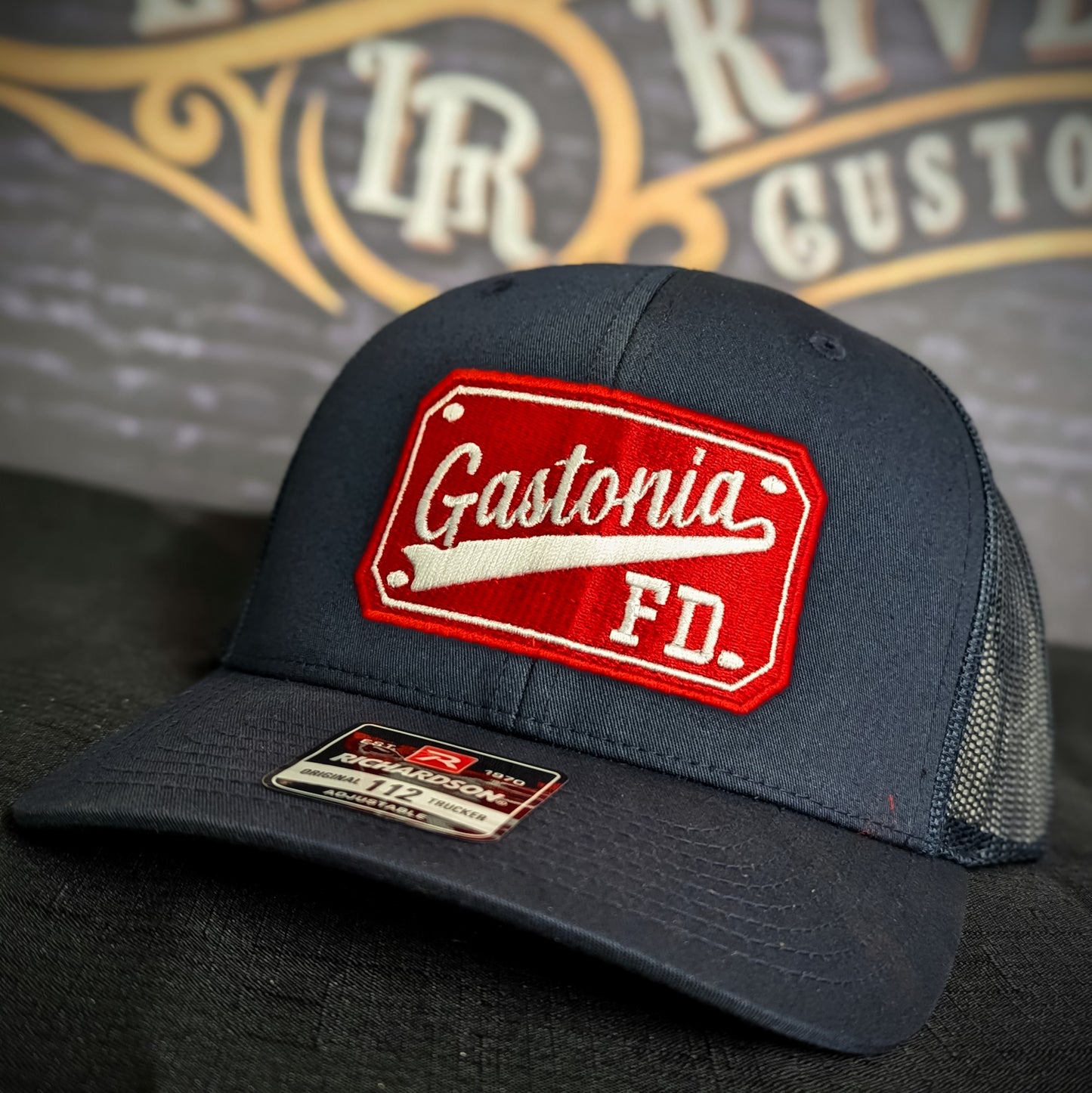 Custom embroidered firefighter hat with bold stitching, structured fit, and premium Richardson snapback design