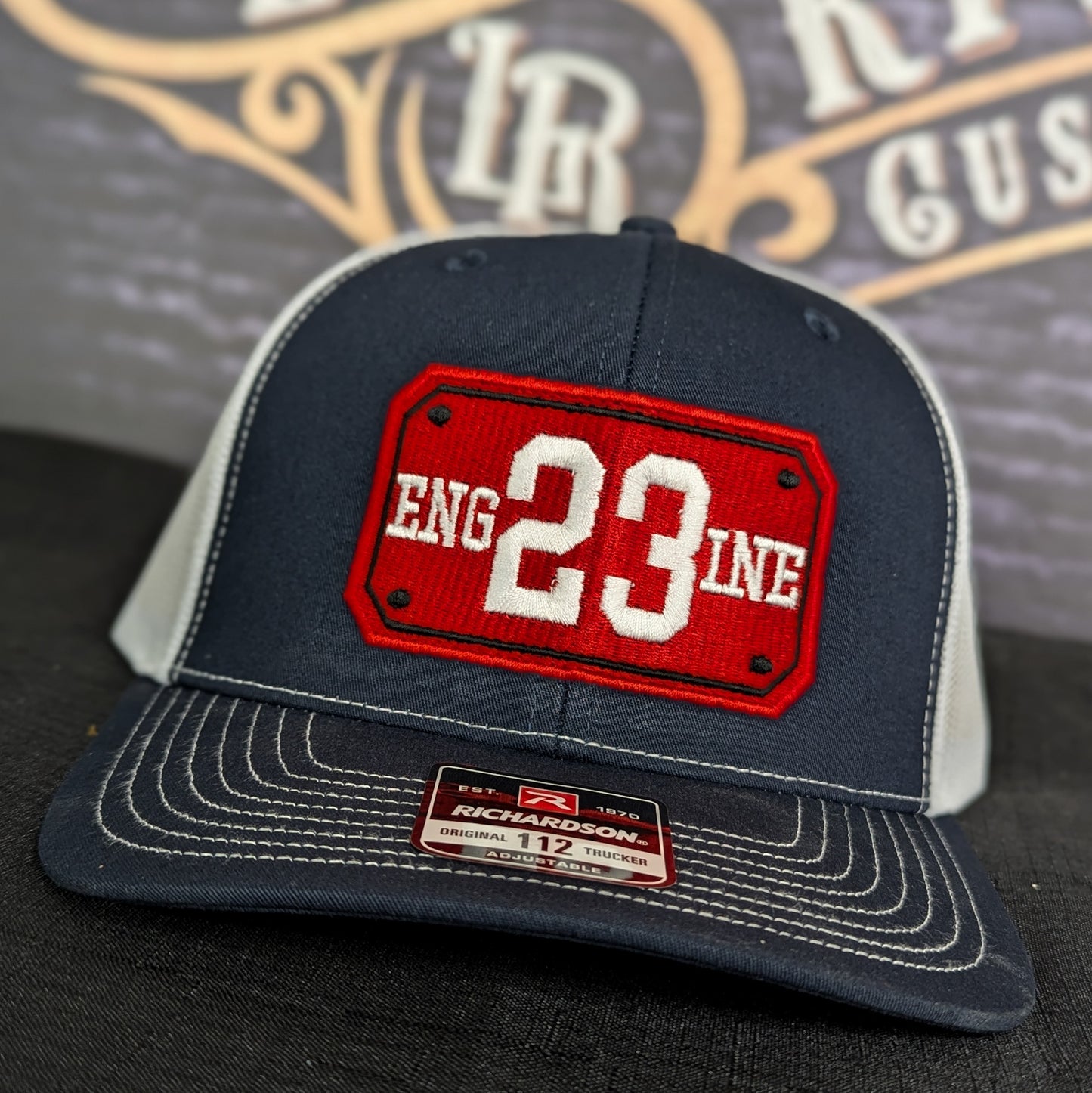 Custom embroidered firefighter hat with bold stitching, structured fit, and premium Richardson snapback design