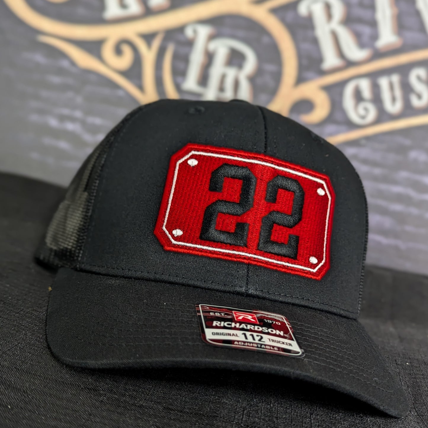 Custom embroidered firefighter hat with bold stitching, structured fit, and premium Richardson snapback design