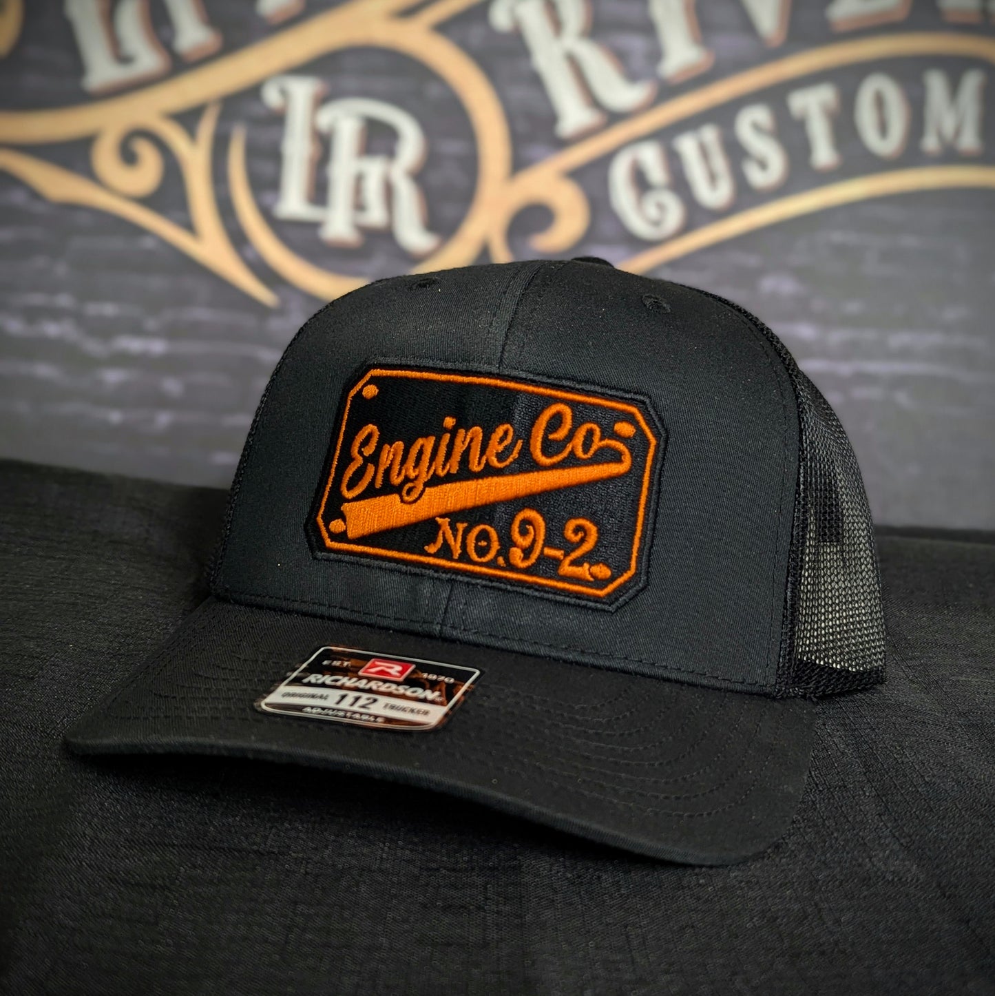 Custom embroidered firefighter hat with bold stitching, structured fit, and premium Richardson snapback design