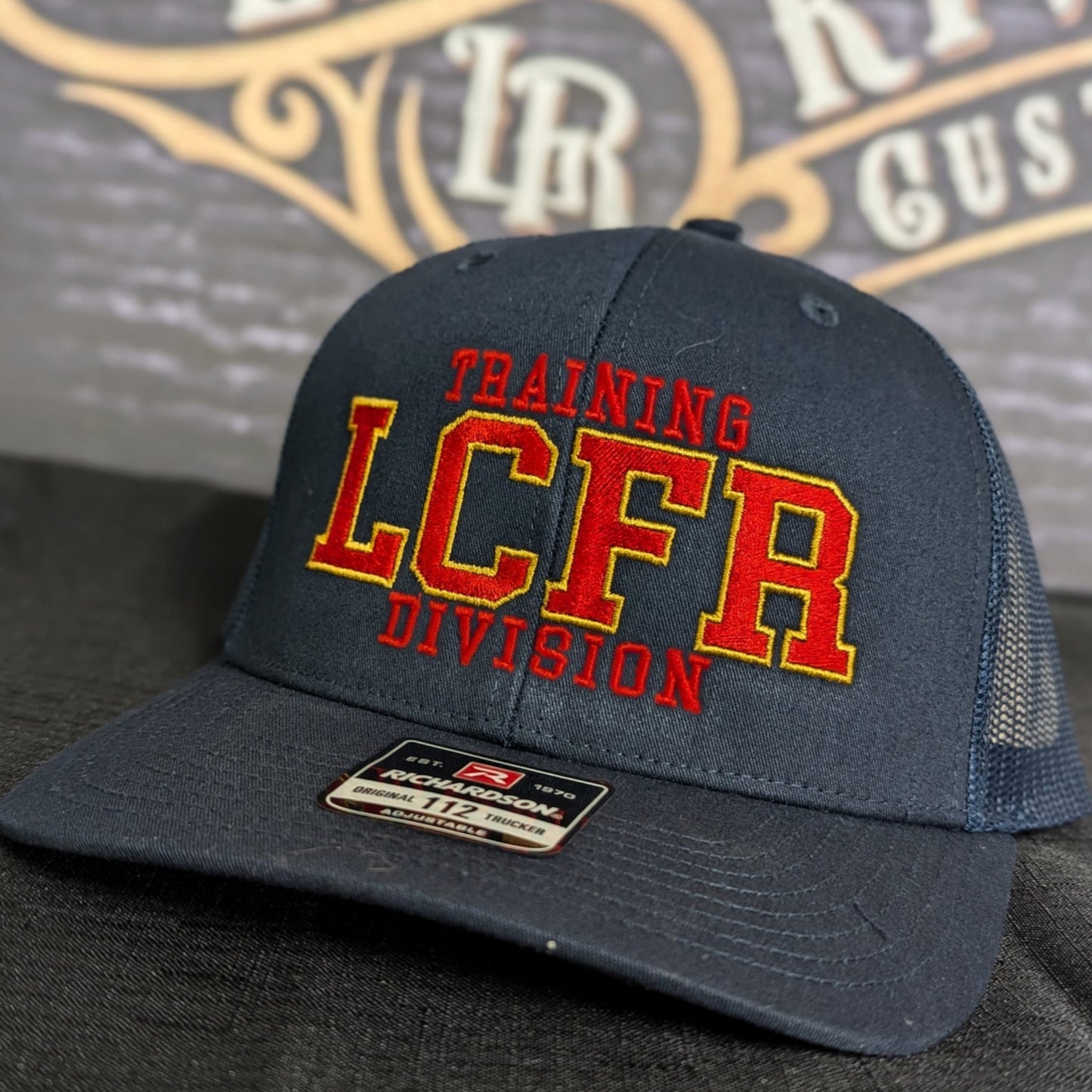 Custom embroidered firefighter hat with bold stitching, structured fit, and premium Richardson snapback design