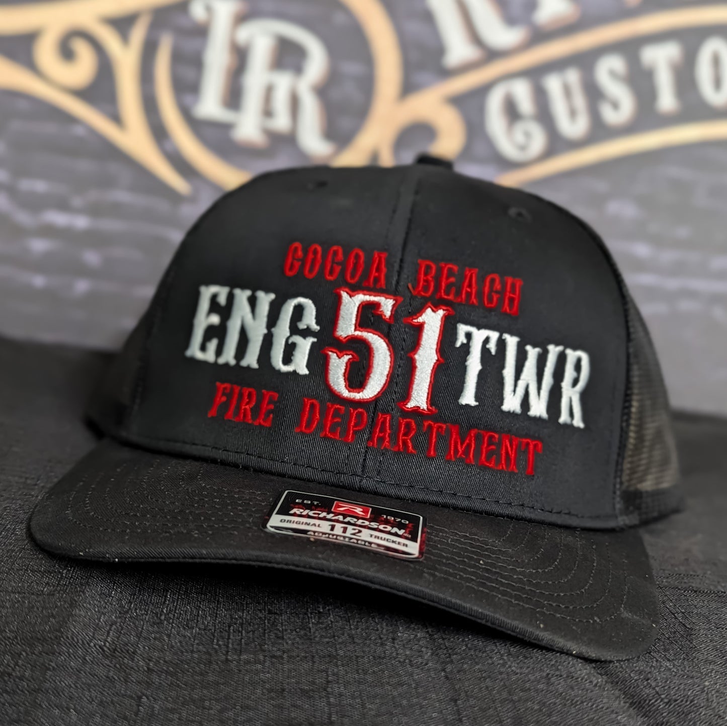 Custom embroidered firefighter hat with bold stitching, structured fit, and premium Richardson snapback design