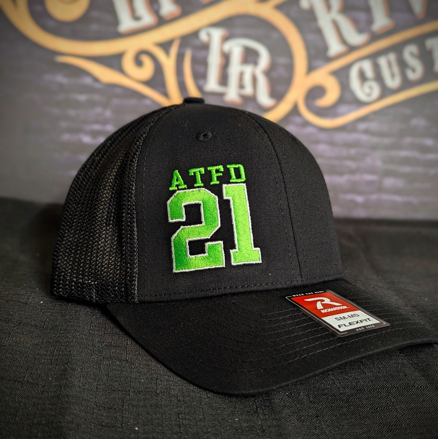Custom embroidered firefighter hat with bold stitching, structured fit, and premium Richardson snapback design