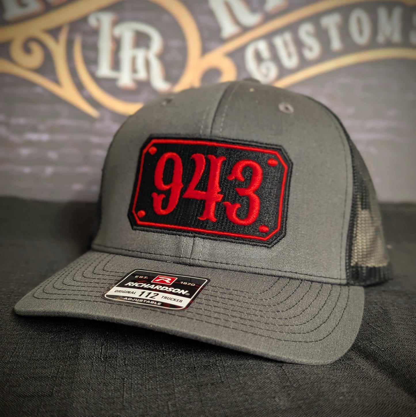 Custom embroidered firefighter hat with bold stitching, structured fit, and premium Richardson snapback design