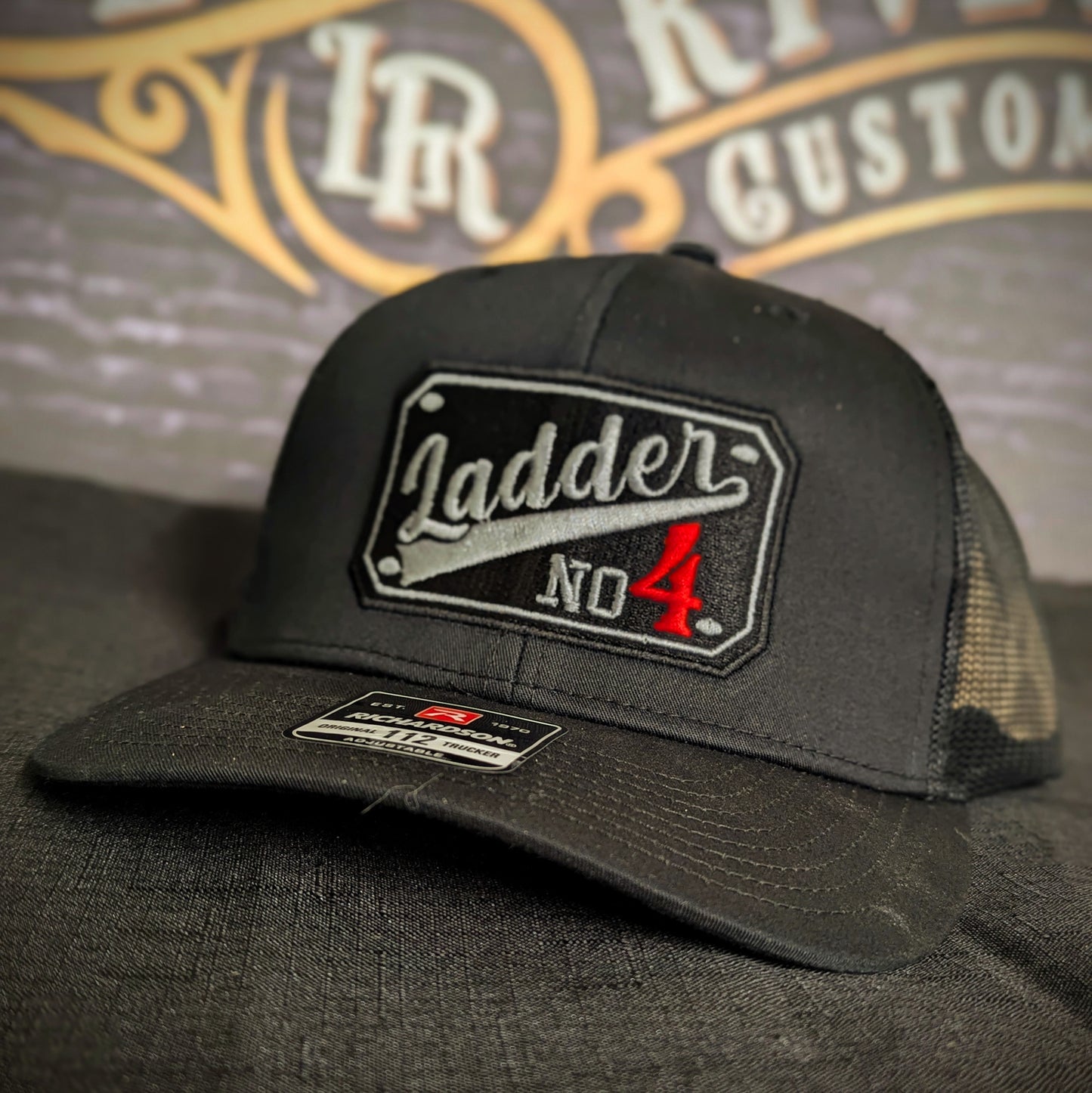 Custom embroidered firefighter hat with bold stitching, structured fit, and premium Richardson snapback design