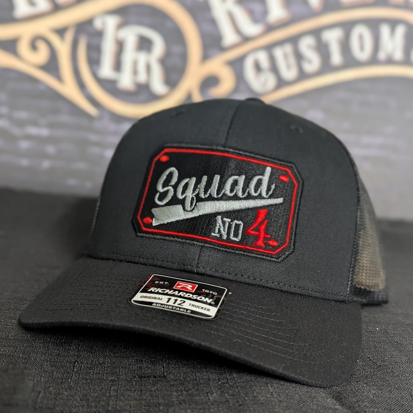 Custom embroidered firefighter hat with bold stitching, structured fit, and premium Richardson snapback design