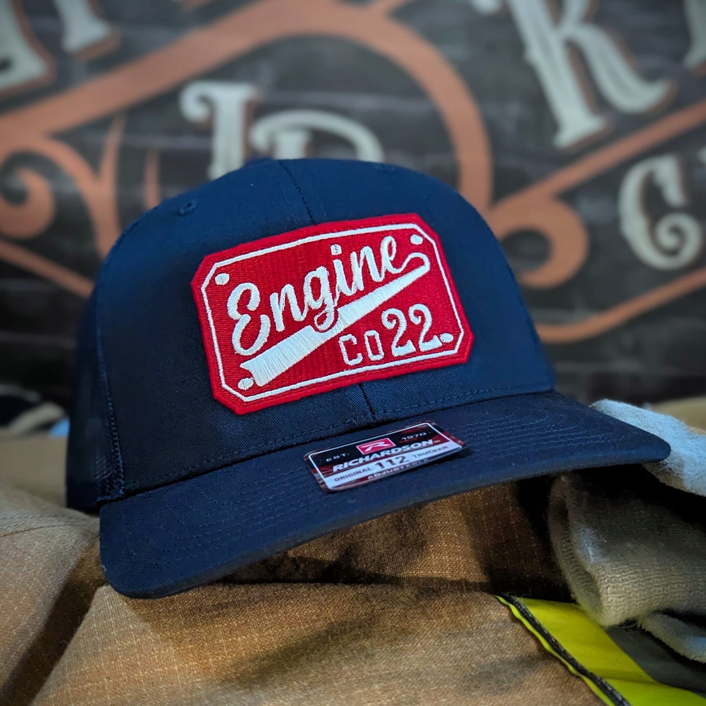 Custom embroidered firefighter hat with bold stitching, structured fit, and premium Richardson snapback design