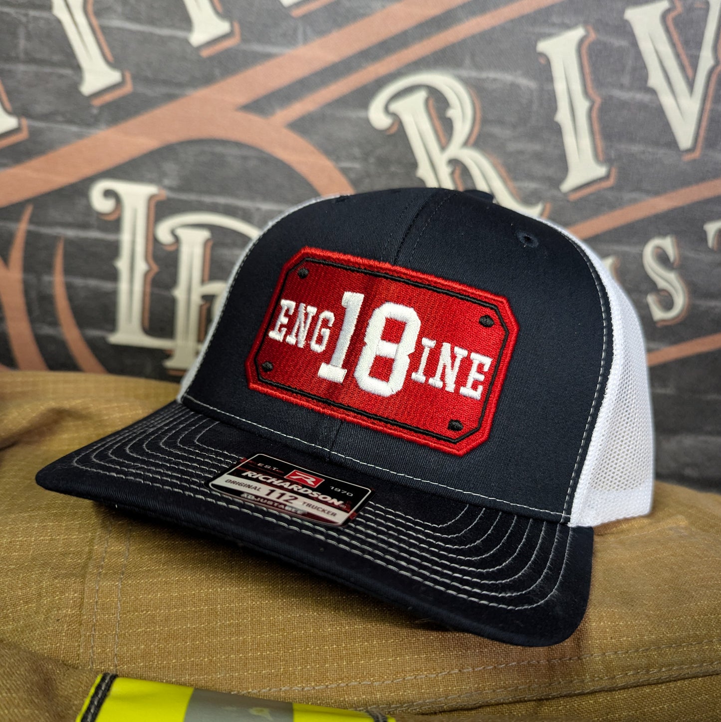 Custom embroidered firefighter hat with bold stitching, structured fit, and premium Richardson snapback design
