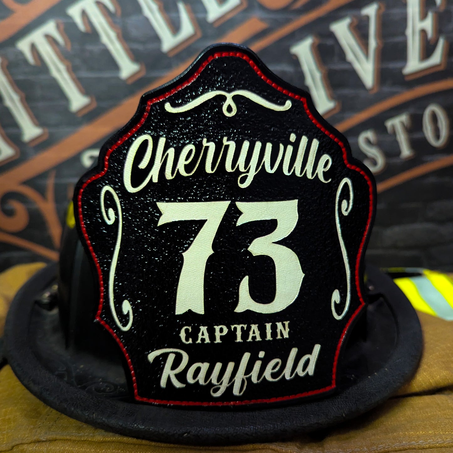 Custom leather firefighter helmet shield with red 27, Tryon Fire Department, Little River Customs