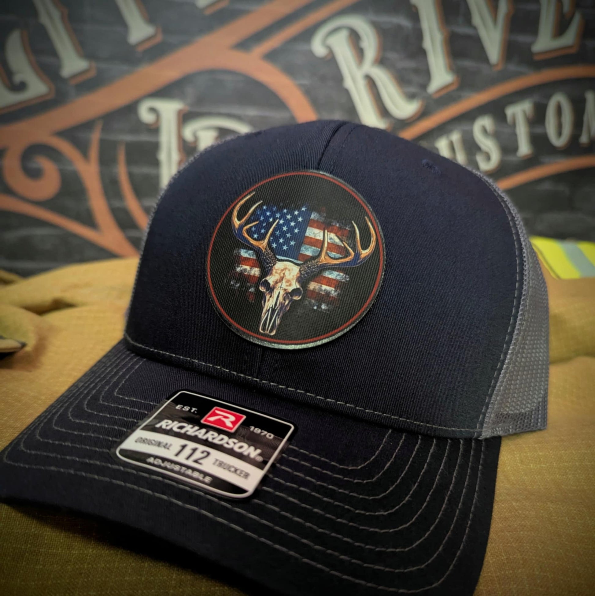 Patriotic deer hunting hat logo variants β displaying multiple USA-themed leather patch designs on Richardson hats