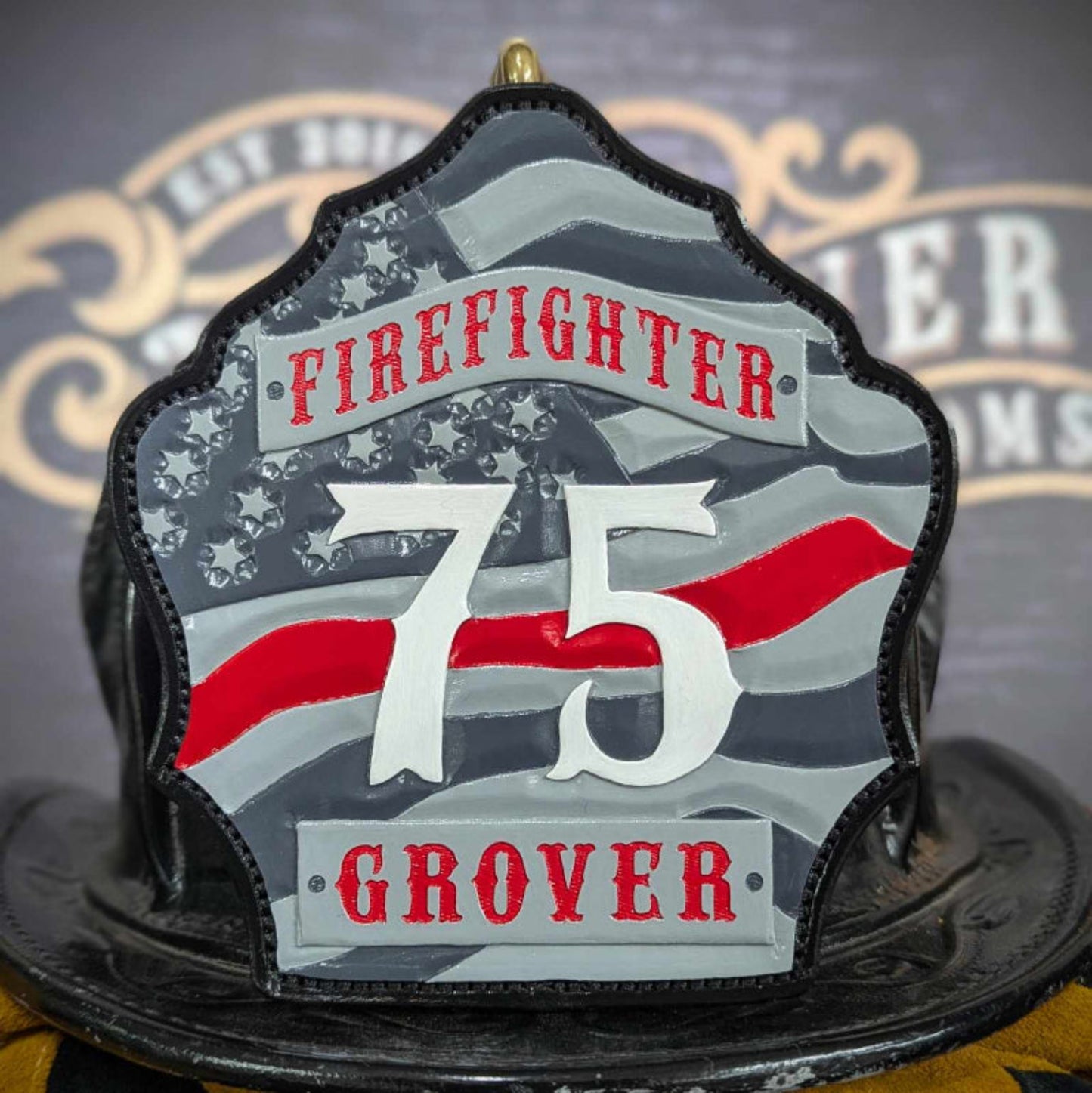Custom firefighter helmet shield with number 75, American flag background, red stripe, and Grover firefighter text
