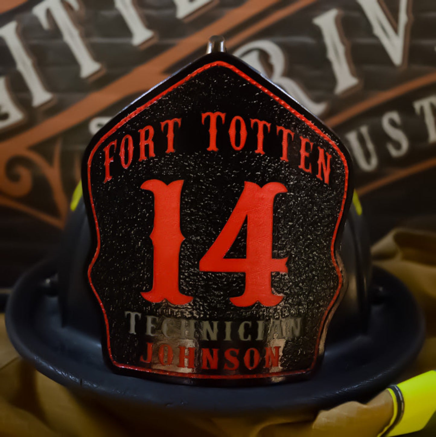 Custom firefighter helmet shield Fort Totten black leather with bold red number 14 and Technician Johnson lettering.
