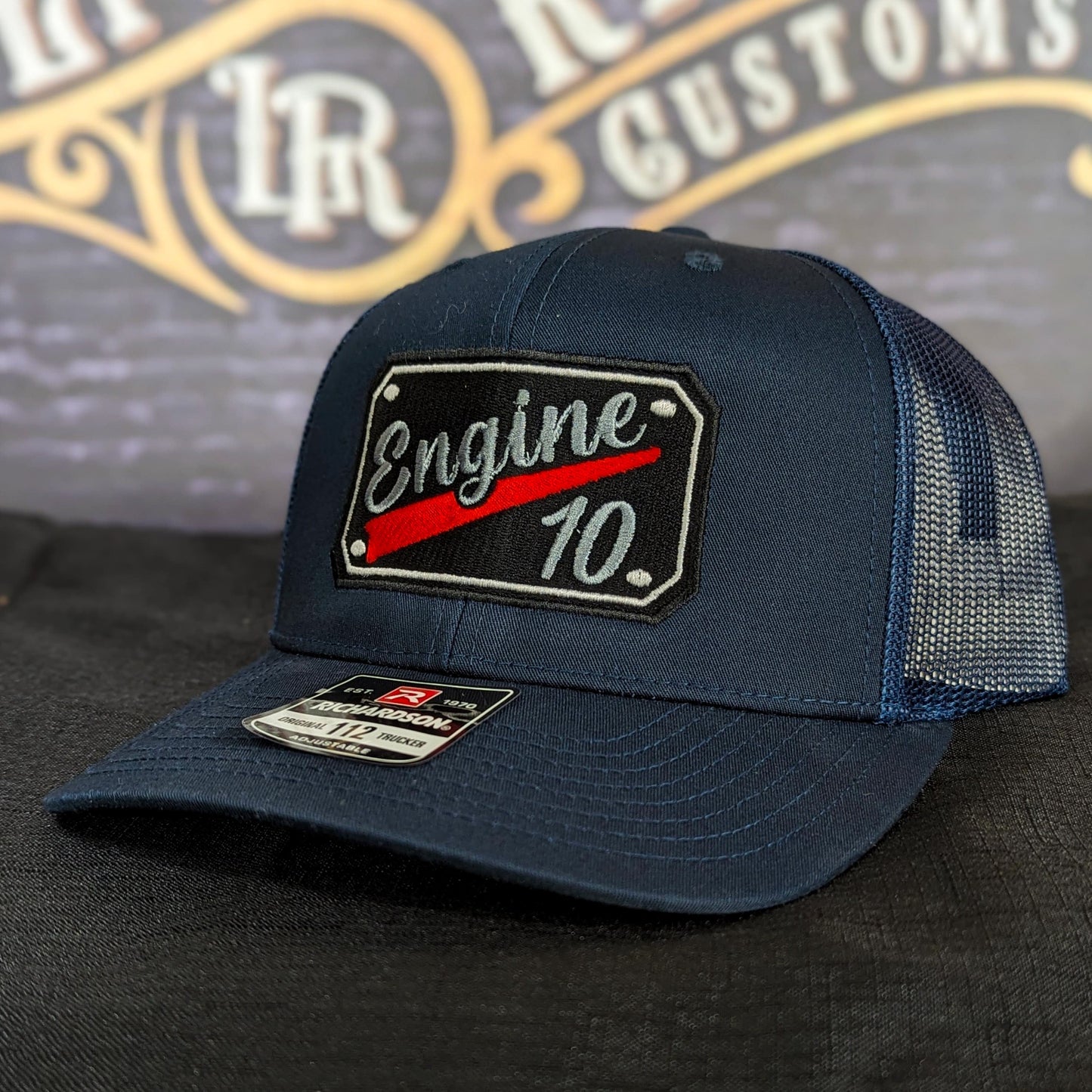 Custom embroidered firefighter hat with bold stitching, structured fit, and premium Richardson snapback design