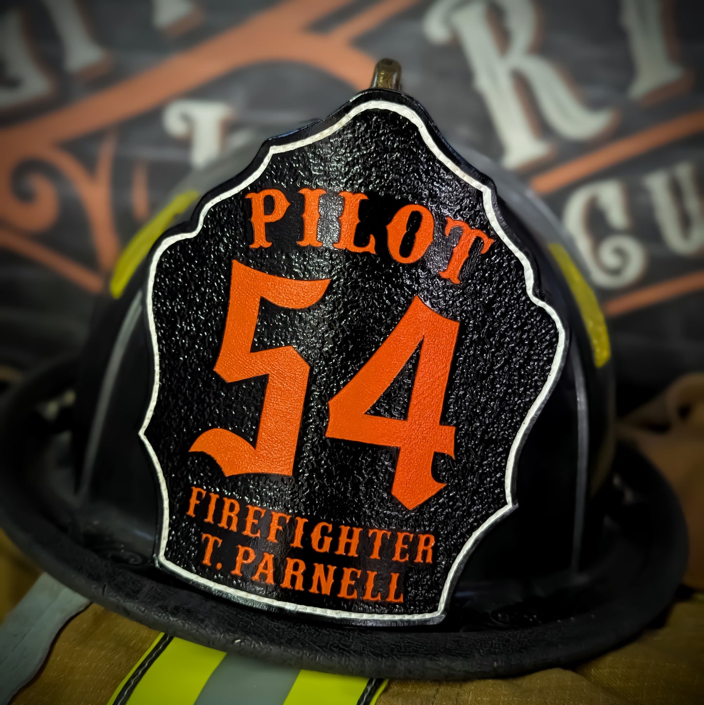 Custom leather firefighter helmet shield for Pilot Fire Dept, black with orange 54 and Firefighter T. Parnell, white trim