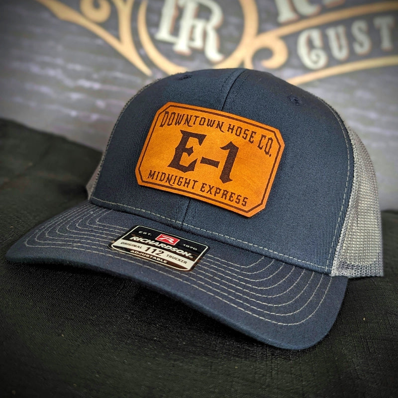 Custom station hat featuring passport leather patch