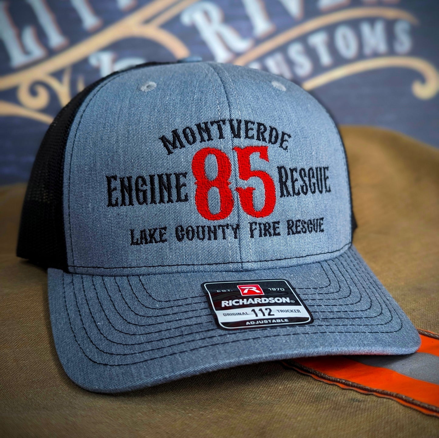 Custom embroidered firefighter hat with bold stitching, structured fit, and premium Richardson snapback design