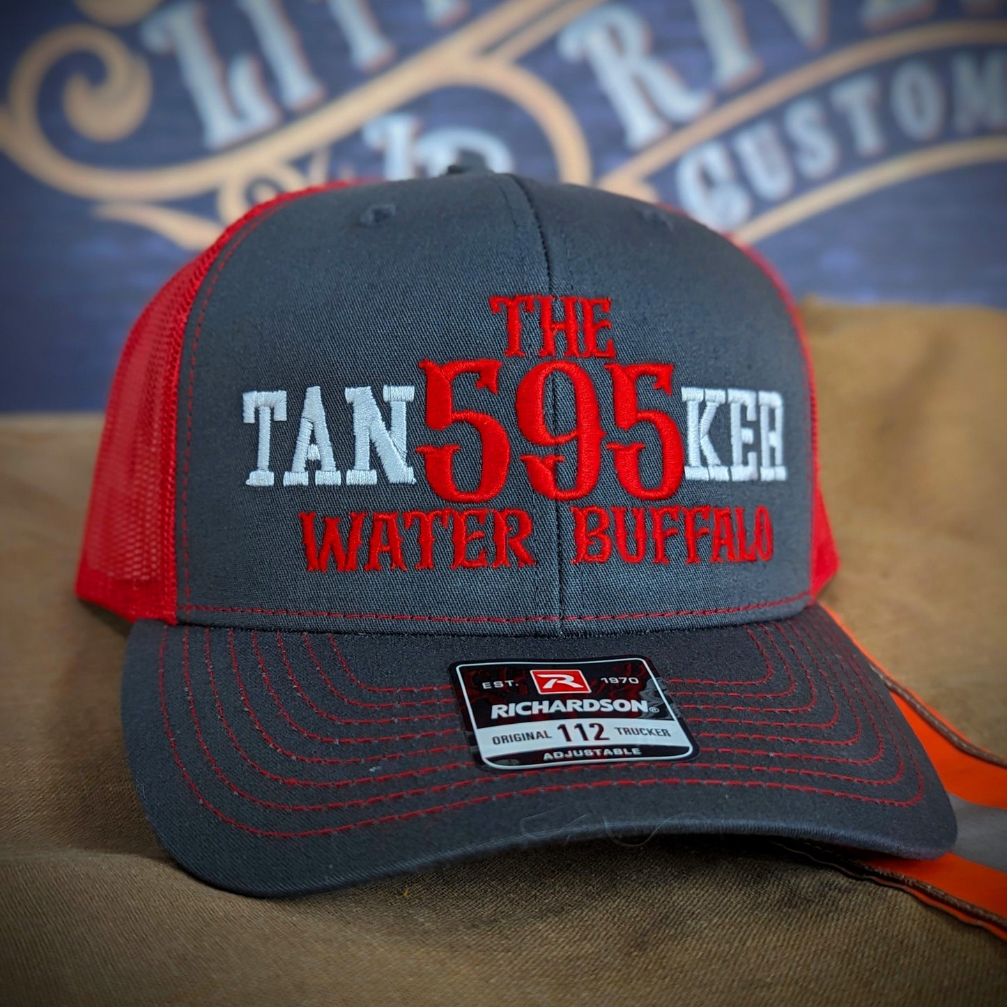 Custom embroidered firefighter hat with bold stitching, structured fit, and premium Richardson snapback design