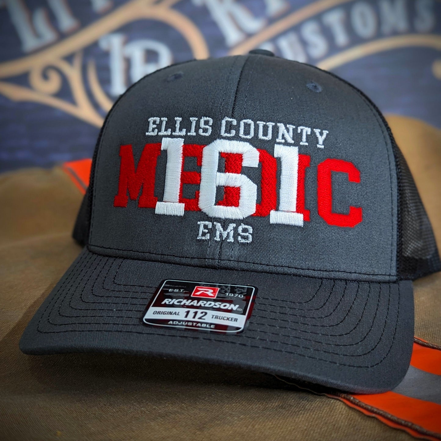 Custom embroidered firefighter hat with bold stitching, structured fit, and premium Richardson snapback design