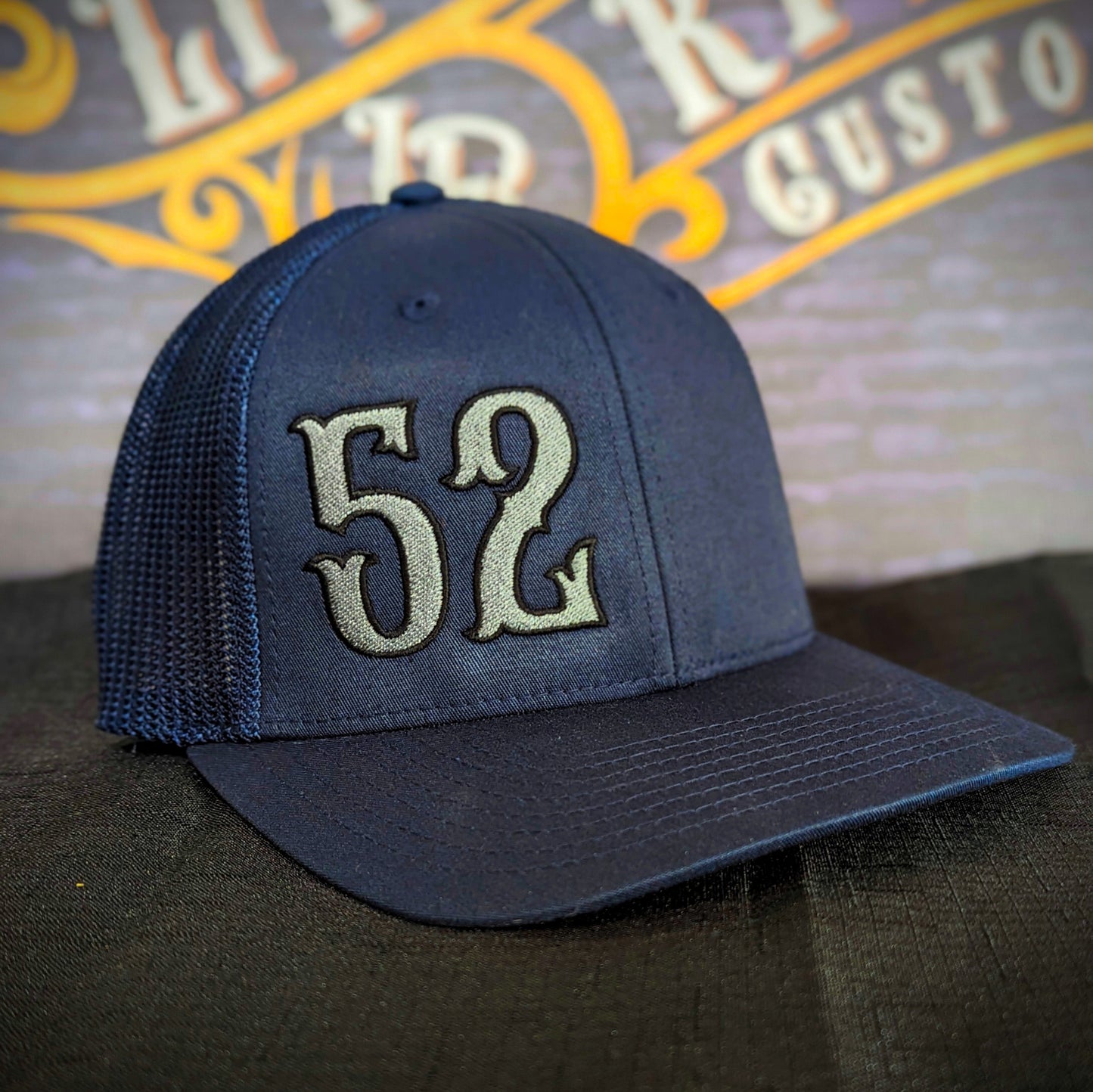 Custom embroidered firefighter hat with bold stitching, structured fit, and premium Richardson snapback design