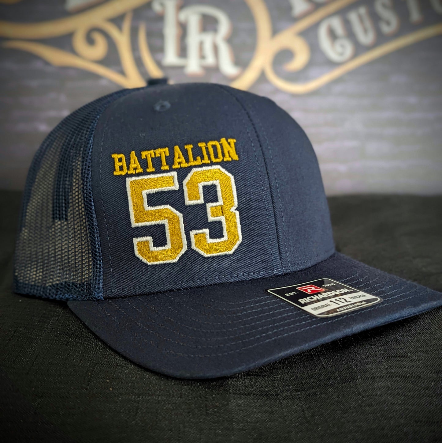 Custom embroidered firefighter hat with bold stitching, structured fit, and premium Richardson snapback design
