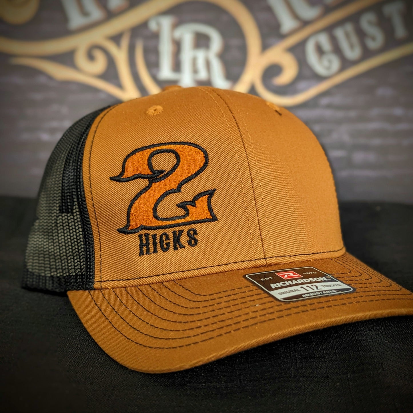 Custom embroidered firefighter hat with bold stitching, structured fit, and premium Richardson snapback design