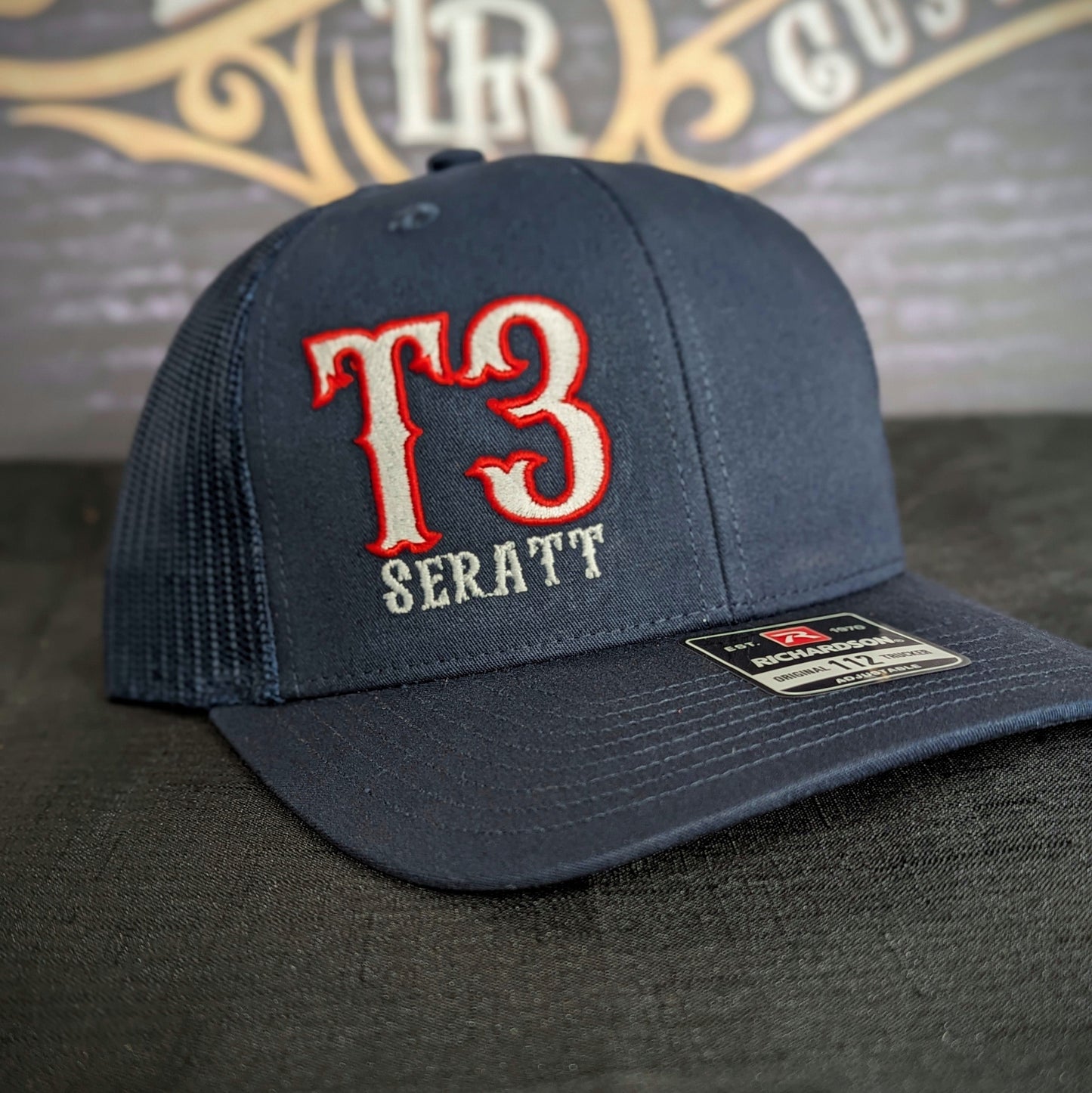 Custom embroidered firefighter hat with bold stitching, structured fit, and premium Richardson snapback design