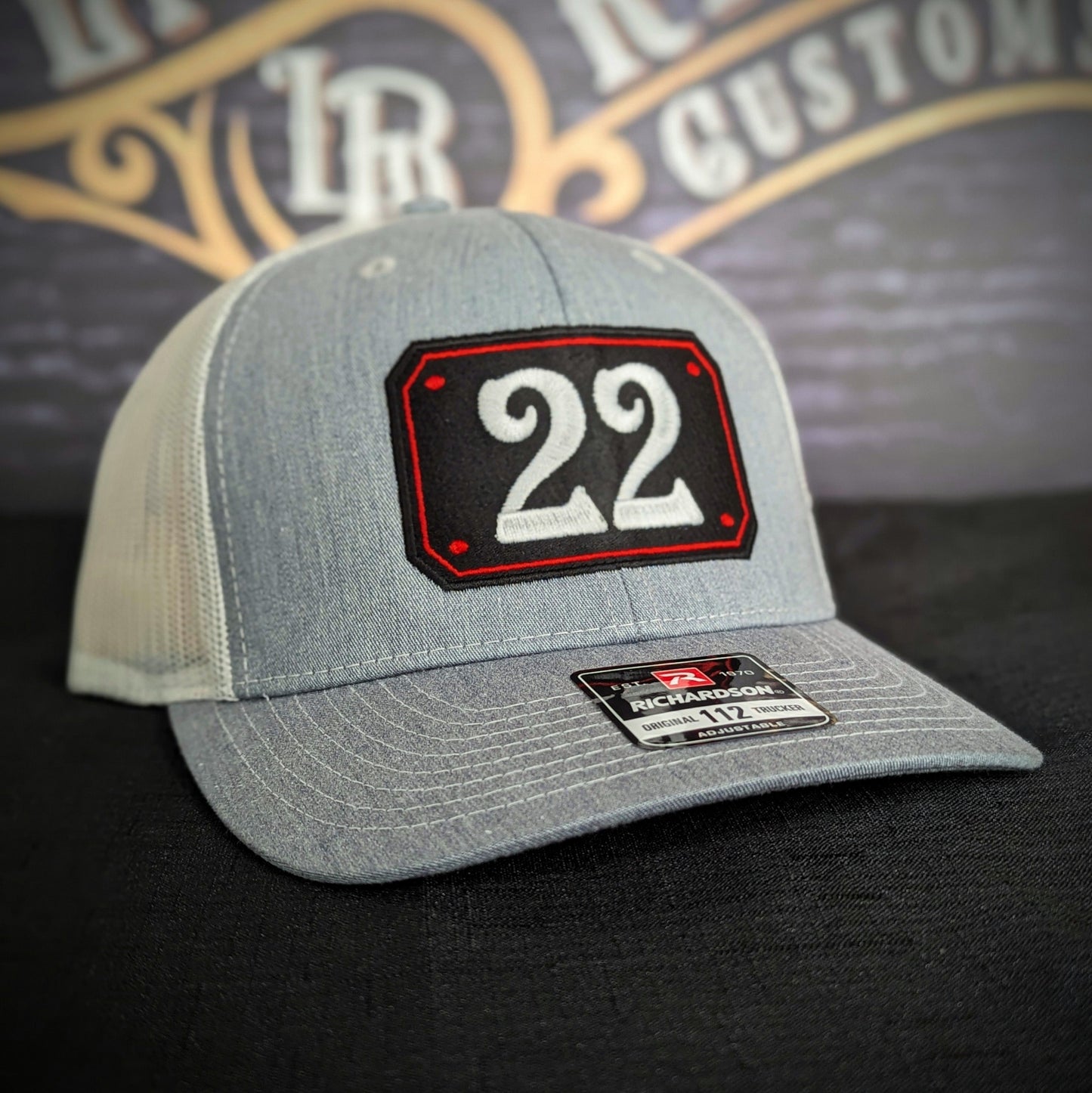 Custom embroidered firefighter hat with bold stitching, structured fit, and premium Richardson snapback design