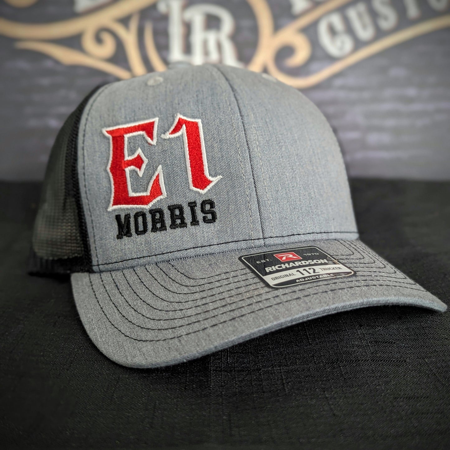 Custom embroidered firefighter hat with bold stitching, structured fit, and premium Richardson snapback design