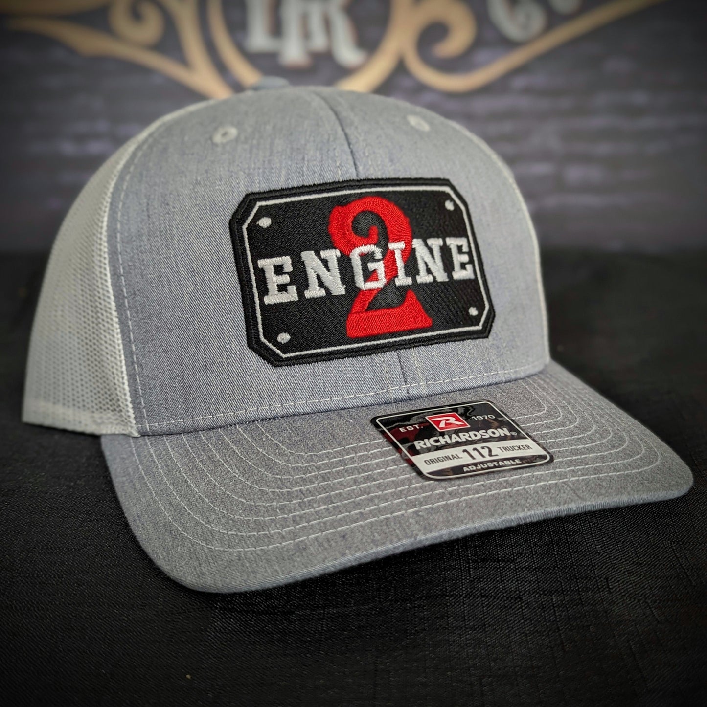 Custom embroidered firefighter hat with bold stitching, structured fit, and premium Richardson snapback design