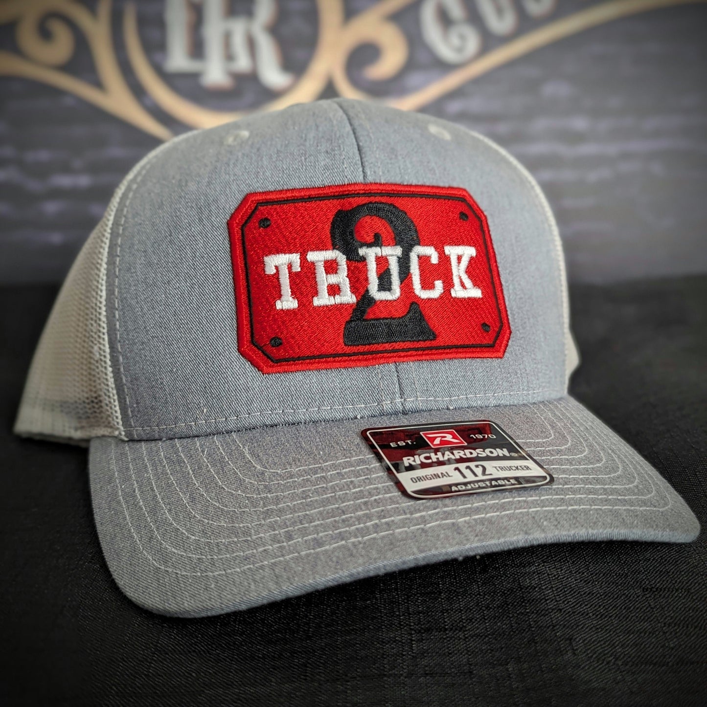 Custom embroidered firefighter hat with bold stitching, structured fit, and premium Richardson snapback design