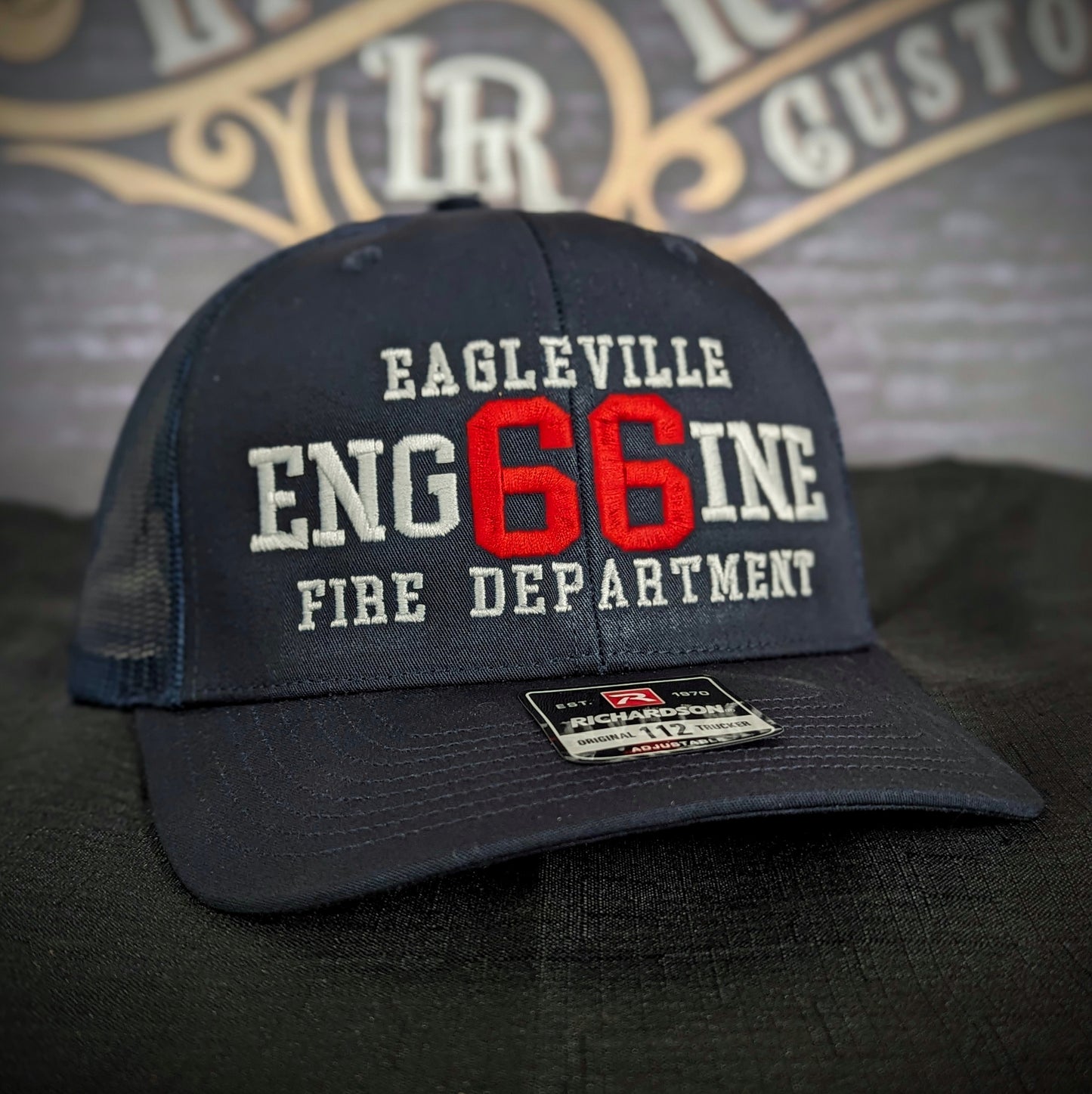 Custom embroidered firefighter hat with bold stitching, structured fit, and premium Richardson snapback design