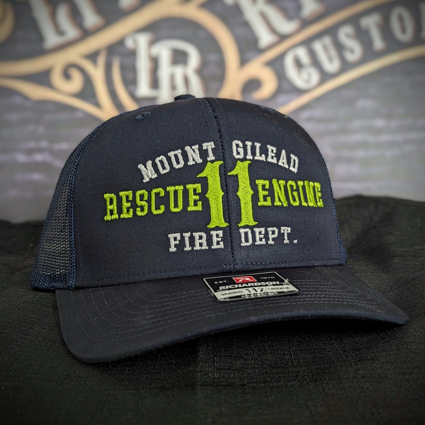 Custom embroidered firefighter hat with bold stitching, structured fit, and premium Richardson snapback design