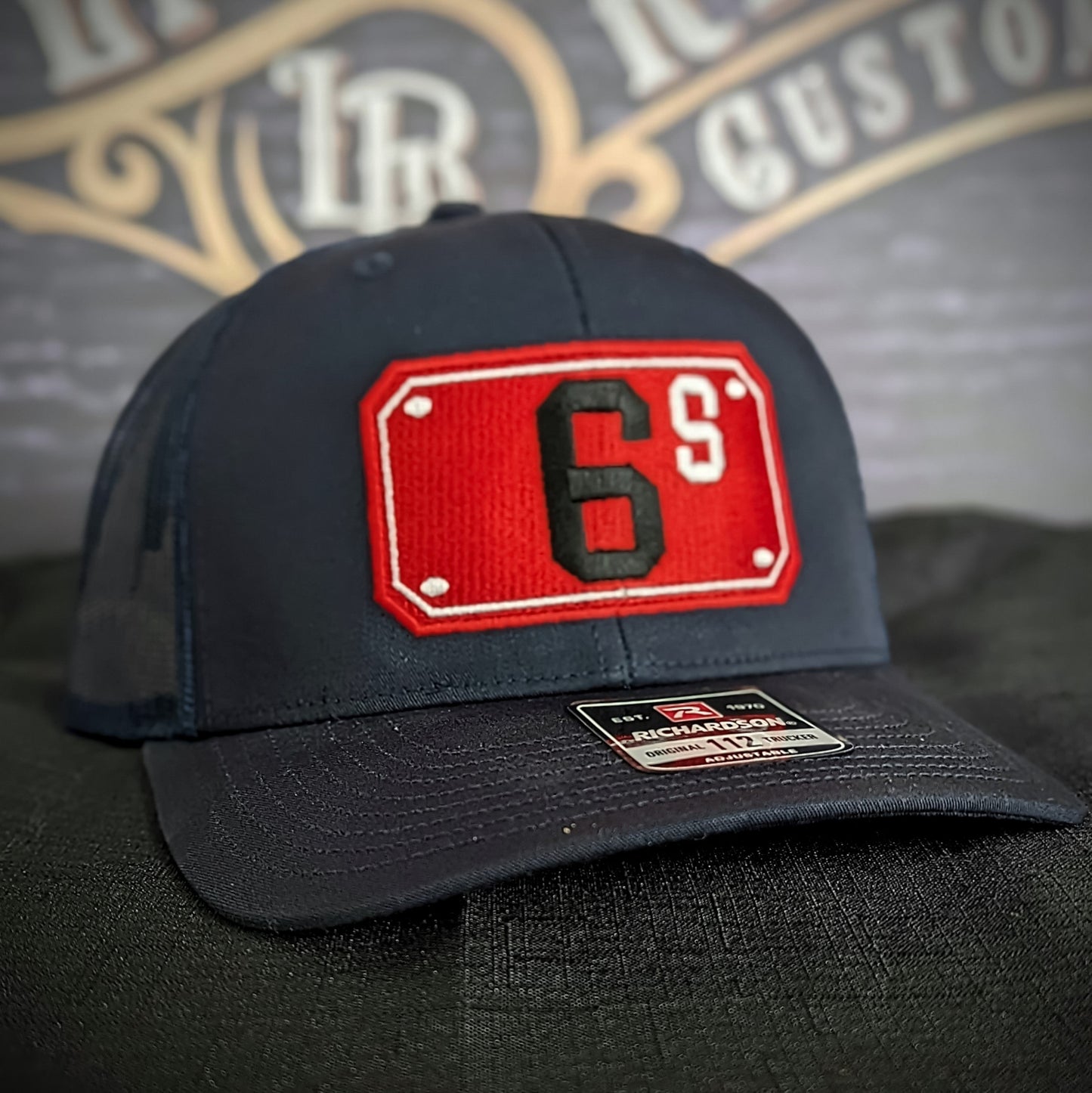 Custom embroidered firefighter hat with bold stitching, structured fit, and premium Richardson snapback design
