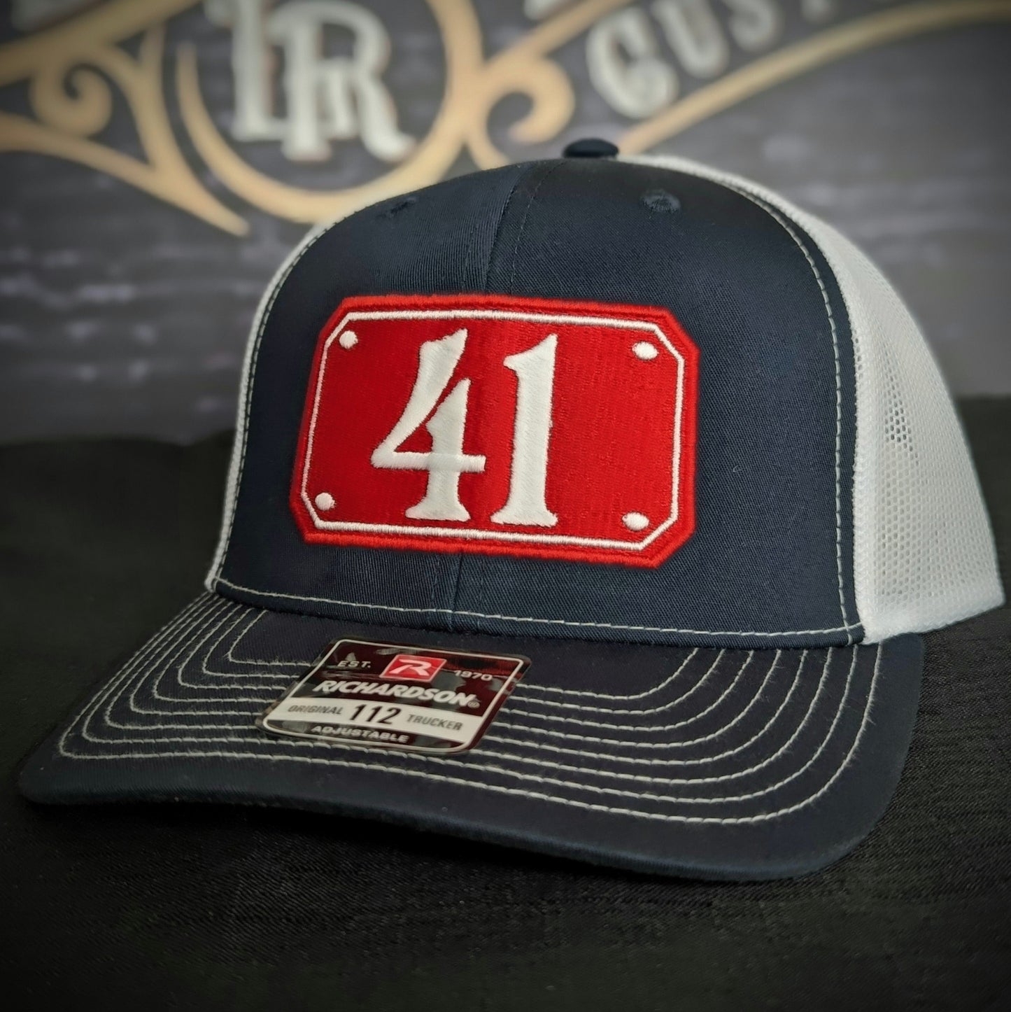 Custom embroidered firefighter hat with bold stitching, structured fit, and premium Richardson snapback design