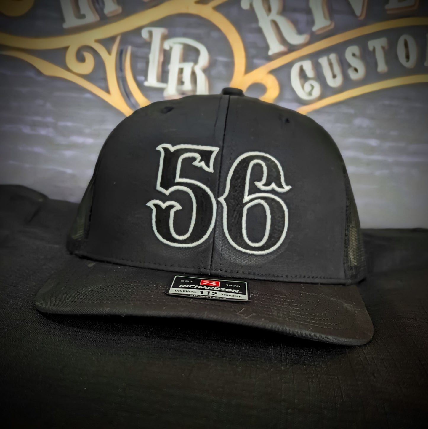Custom embroidered firefighter hat with bold stitching, structured fit, and premium Richardson snapback design