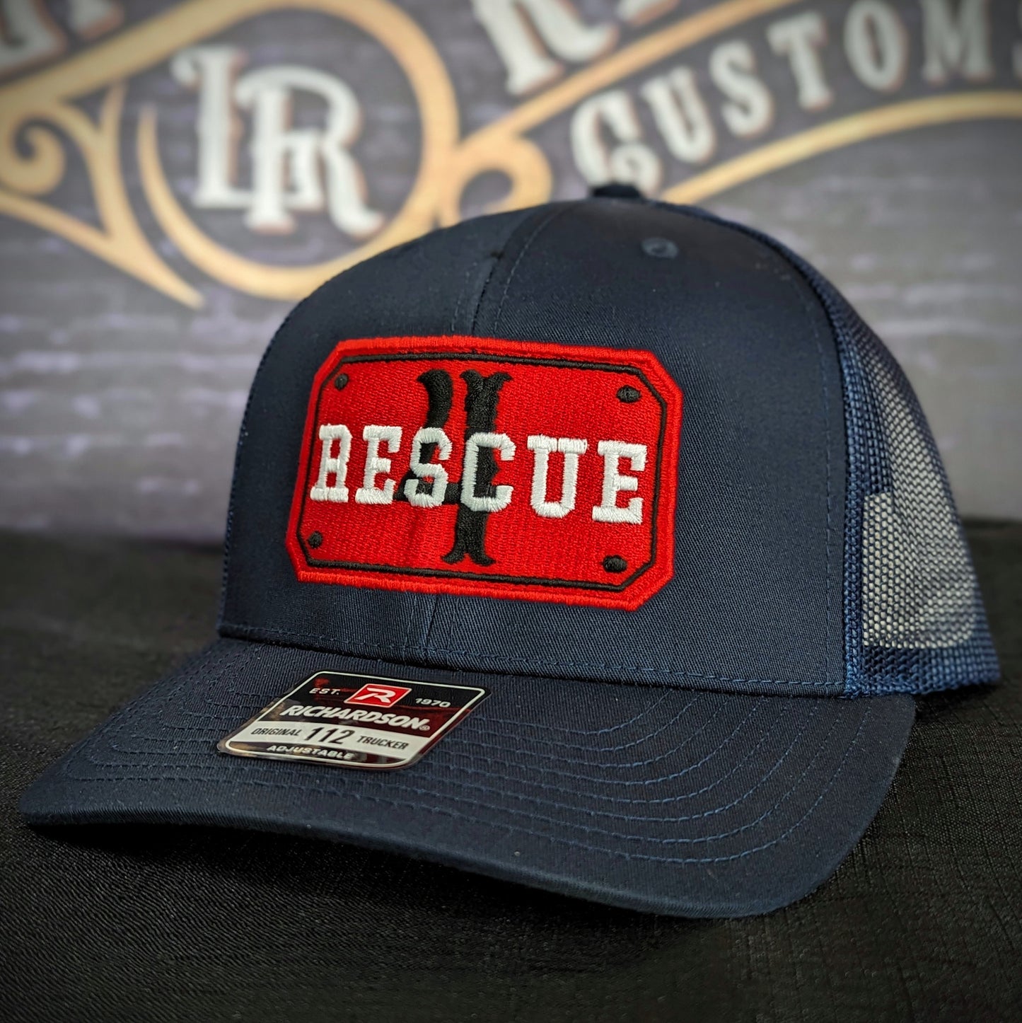 Custom embroidered firefighter hat with bold stitching, structured fit, and premium Richardson snapback design