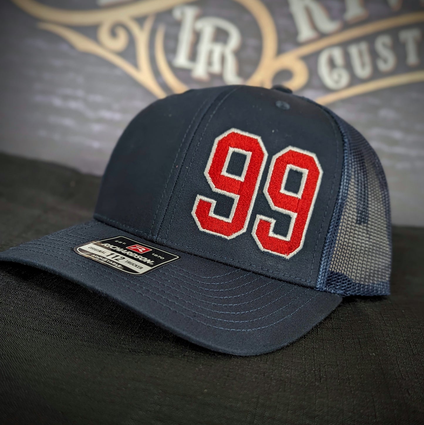 Custom embroidered firefighter hat with bold stitching, structured fit, and premium Richardson snapback design