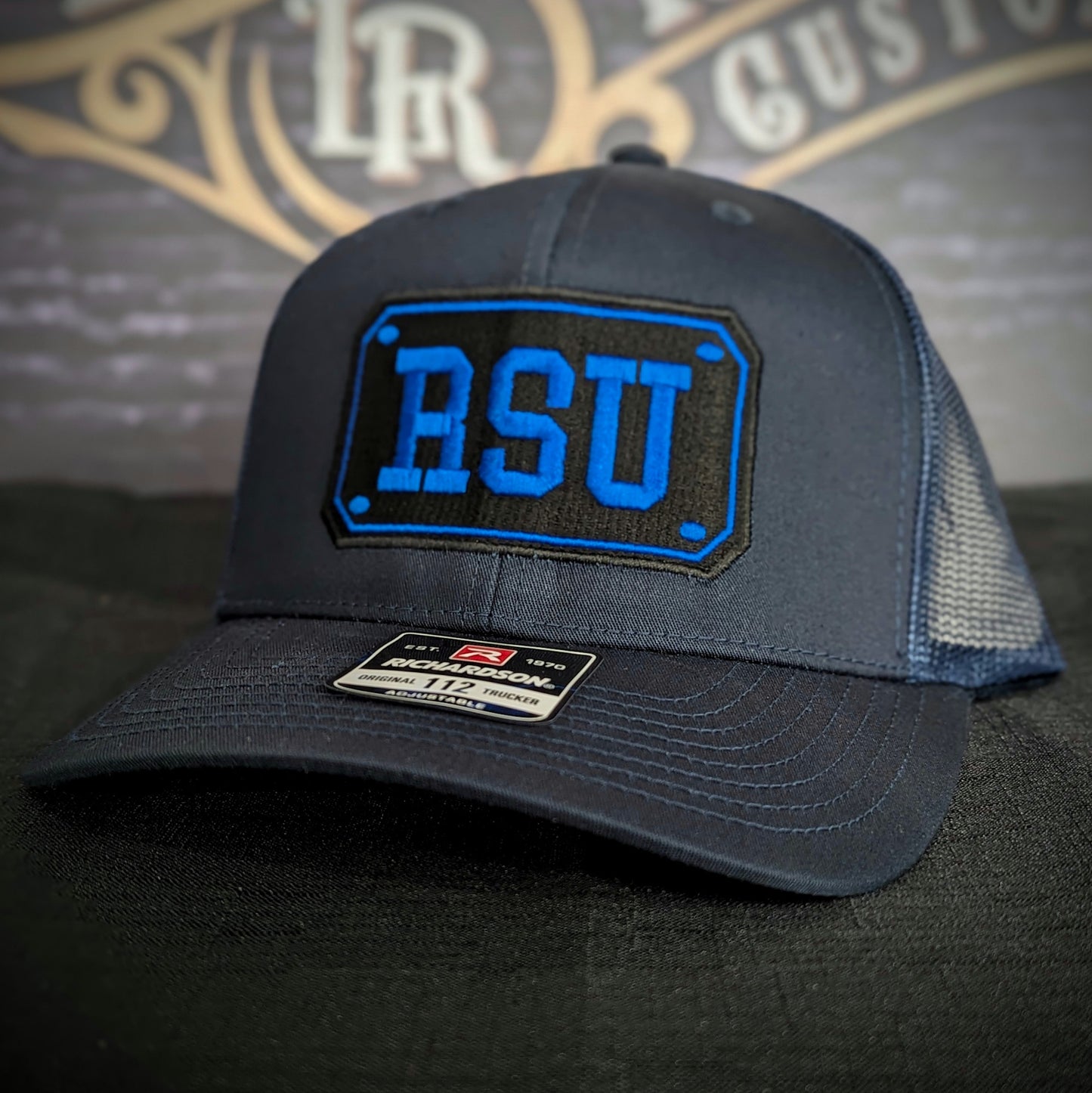Custom embroidered firefighter hat with bold stitching, structured fit, and premium Richardson snapback design