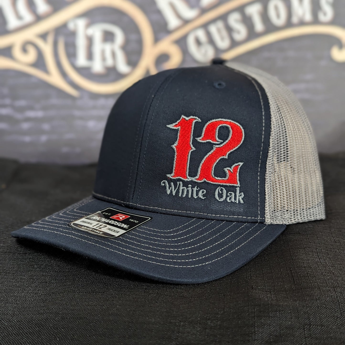 Custom embroidered firefighter hat with bold stitching, structured fit, and premium Richardson snapback design