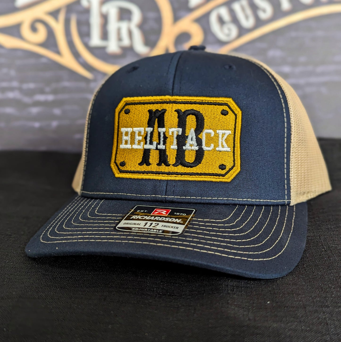 Custom embroidered firefighter hat with bold stitching, structured fit, and premium Richardson snapback design