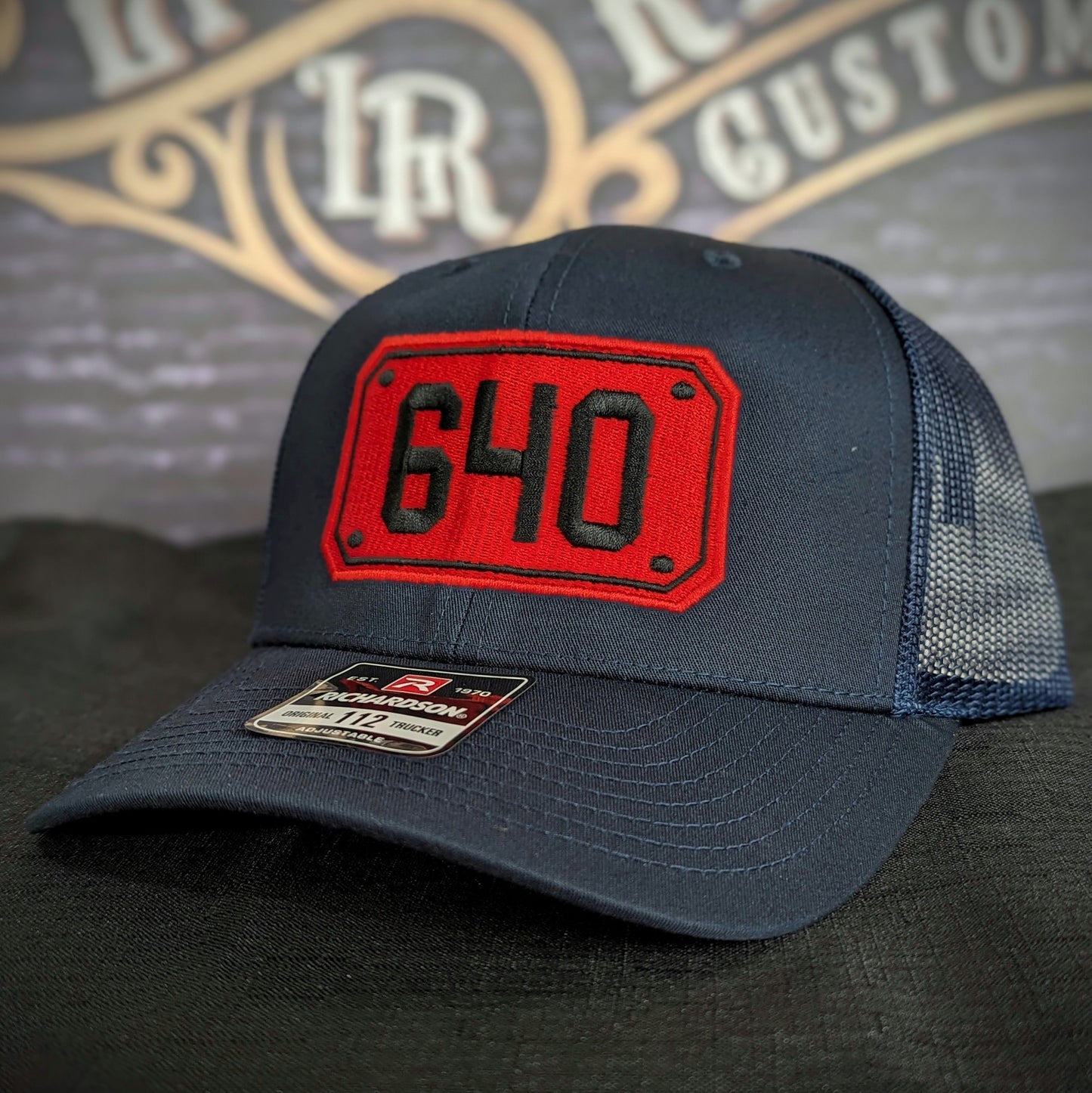 Custom embroidered firefighter hat with bold stitching, structured fit, and premium Richardson snapback design